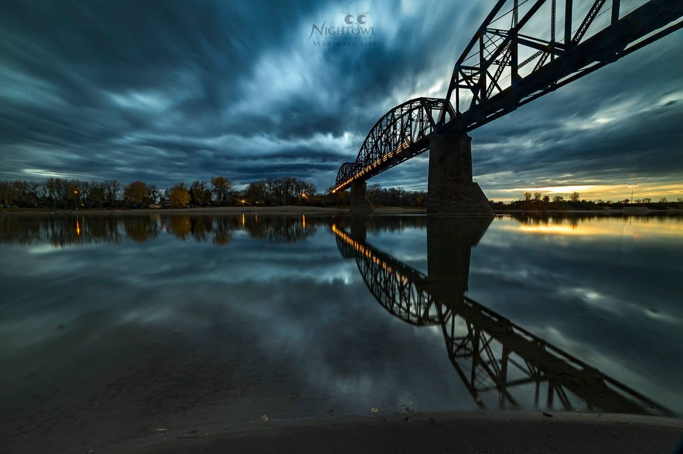The bridge beneath a dramatic blue sky