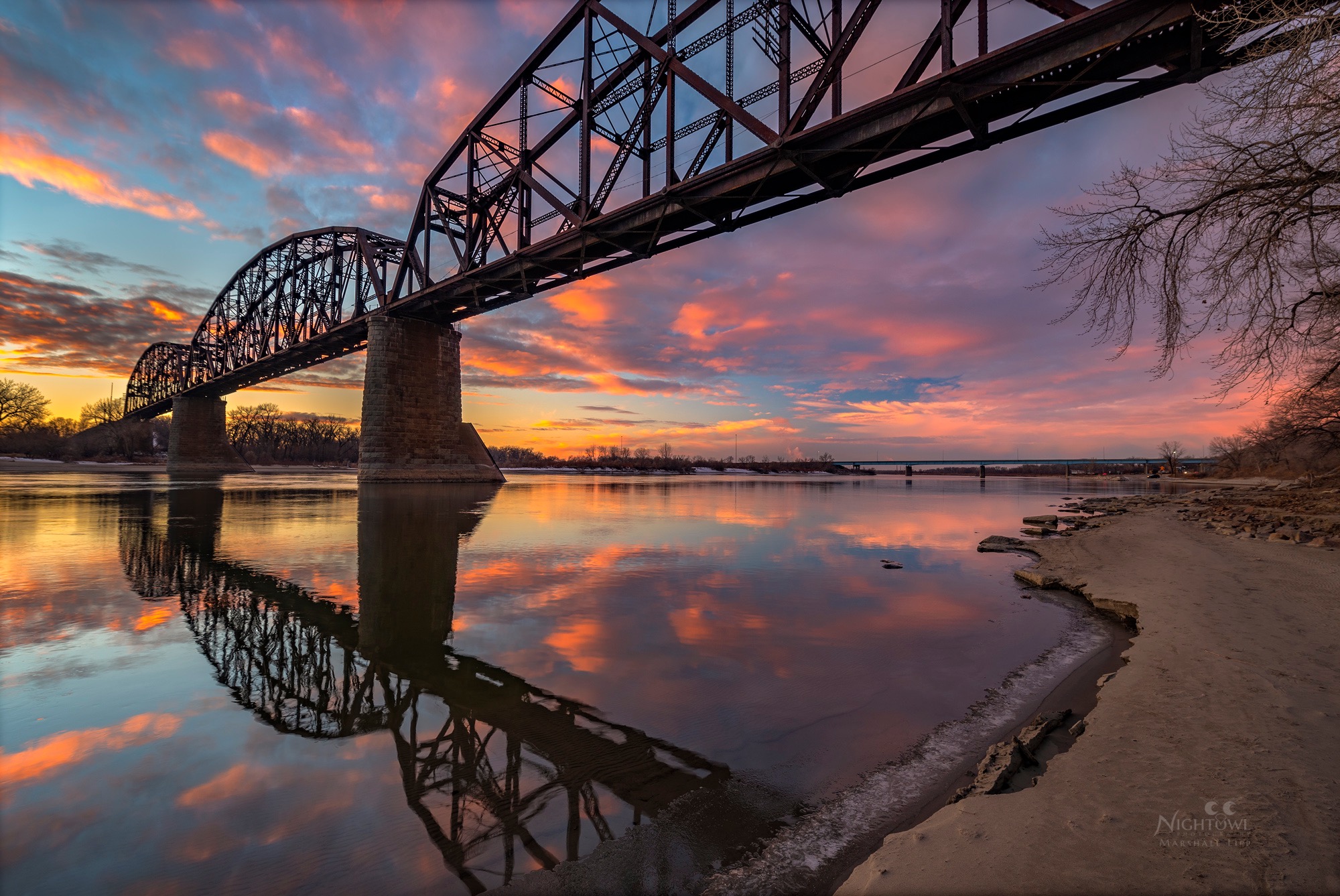 Evening color reflected beneath the bridge