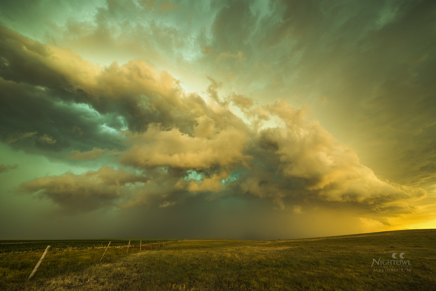 Golden storm light over open country