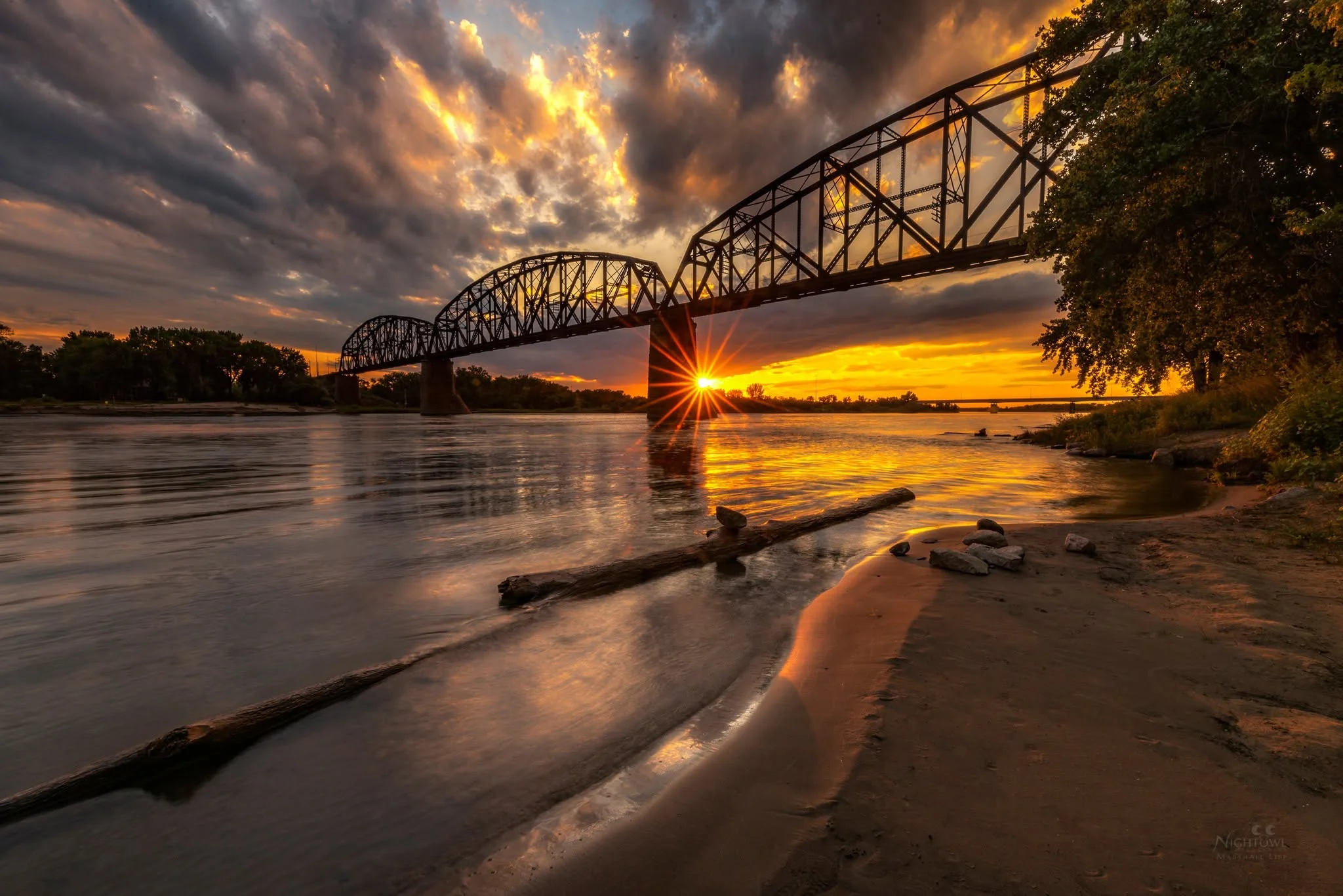 Sunburst through the train bridge